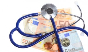 cost of health care: stethoscope on euro money